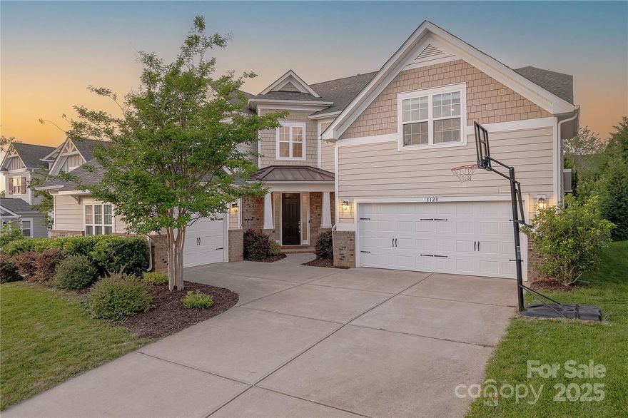 Situated on a premium lot in desirable Habersham, this Shea Oxford plan combines grandeur & functionality perfectly. Grand chef‘s kitchen features expansive island, gas cooking, ample 42" cabinets & upgraded stainless appliances. Large great room w/ fireplace & built-in shelving is ideal for relaxation & entertainment. Amazing first floor suite has attached multipurpose room that can serve as living room/office, ideal for potential multi-generational living. Oversized primary suite features enormous walk-in closet & spa like bathroom w/ double vanity, glass enclosed tile shower & garden tub. 3 additional generously sized bedrooms on the second floor + huge bonus room. Relax on the covered porch overlooking backyard w/ mature privacy landscaping. 3 car courtyard garage. Conveniently located moments from premier shopping, dining & entertainment with award-winning Fort Mill schools, Habersham offers pool, clubhouse, playground,pond w/ dock & walking trails. This is one that you must see!