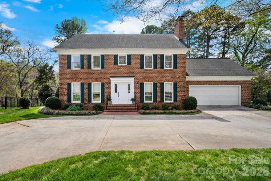 Welcome to this stately, well-maintained two-story full brick home nestled on a quiet cul-de-sac minutes from Glenn C. Hilton, Jr. Memorial Park, shopping, dining, and downtown Hickory.  Situated on a level, beautifully manicured lot, this property offers impressive curb appeal with mature landscaping and a slightly elevated setting above the main road.  The circular driveway provides convenient access and ample space for residents and guests.  Inside, you'll find a spacious and inviting layout featuring two comfortable living areas, perfect for relaxing and entertaining.  Loved ones and friends will appreciate the open kitchen with island and dining that looks out onto the deck. Gather in the private, generously sized backyard which is ideal for peaceful outdoor enjoyment.  This home offers 4 bedrooms, laundry room, plenty of closets, and 2.5 baths, providing plenty of space for everyday living.  Savor the unique charm of two fireplaces - one in the cozy family room and another in the primary bedroom, creating a warm and inviting retreat.  This is a must see property that combines classic elegance with everyday comfort in a highly desirable location.