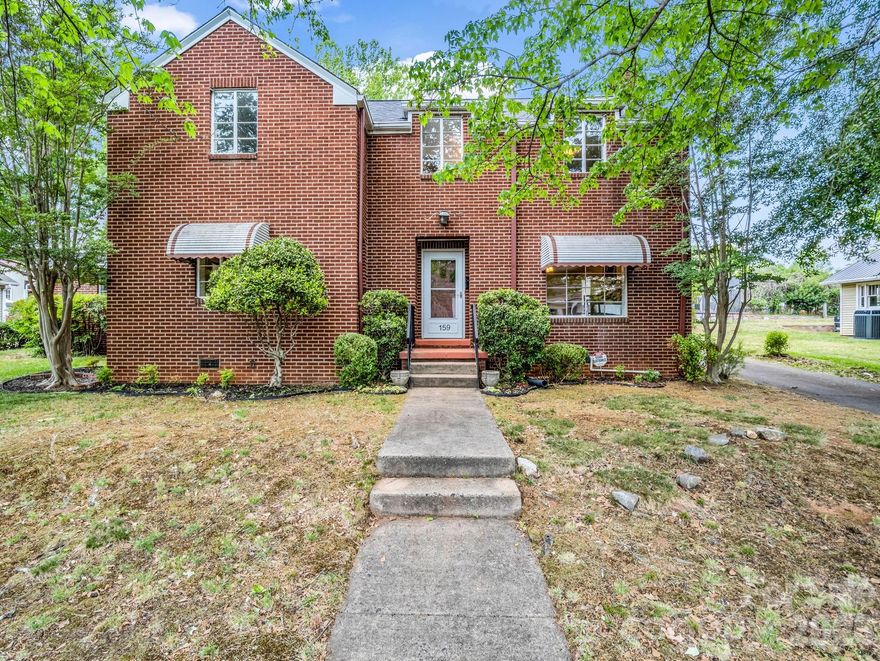 Charming 4-bedroom, 2.5-bath home located in the heart of Forest City, just minutes from Main Street dining, shopping, and local events. Built in 1950, this home offers timeless character with mostly wood flooring throughout and classic architectural details. Situated on a 0.28-acre lot, the property features a glass-enclosed porch with screens—perfect for enjoying the seasons year-round. The spacious primary bedroom includes a private full bath and two closets for ample storage. With its blend of vintage charm and convenient location, this home is a must-see!