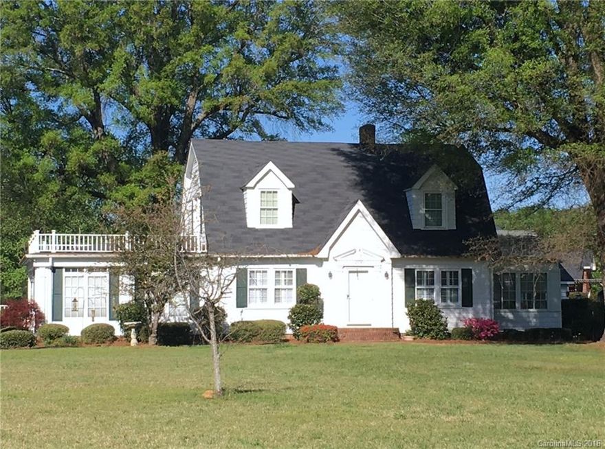 Welcome Home! If you like older homes with character, this one's for you! This one owner Dutch Colonial home has hardwood floors throughout most of the home. Upstairs has two large bedrooms, sunroom, and a full bath. Downstairs has a master bedroom, bath, office, large family room, formal dinning, and sunroom. 2 large workshops and a carport!