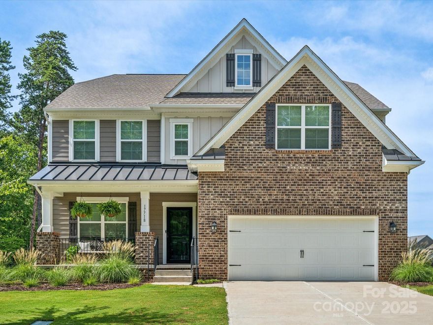 Discover this like-new, move-in-ready waterfront home in The Palisades, boasting updates galore! Inside, you'll find a gourmet kitchen perfect for culinary adventures and a living room enhanced with custom built-ins. Step outside to enjoy a spacious deck, cozy fire pit, and stunning views of Lake Wylie from your own backyard. While dock installation isn't permitted, you can launch a kayak or canoe directly from your property with a path leading right down to the lake. The Palisades offers an oversized pool with a waterslide, tennis and basketball courts, and more. Don’t miss this rare opportunity for lakeside living with endless amenities!
