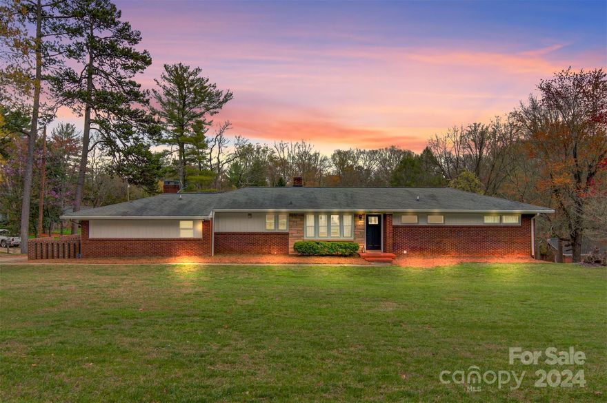 Welcome to your dream home! Nestled just minutes from downtown, Lenoir-Rhyne University, and a plethora of shopping and dining options, this meticulously maintained brick ranch is a true gem. Recently renovated, this 4-bedroom, 2.5-bathroom haven boasts a privately situated master bedroom featuring a luxurious custom walk-in closet and an expansive tile floor seamlessly connecting to a grandiose shower. The heart of the home lies in its spacious kitchen, adorned with ample cabinetry, stainless steel appliances, and sleek quartz countertops, flowing effortlessly into a charming breakfast area and a sunlit living room. Revel in the beauty of brand-new waterproof LVP flooring throughout, complemented by a generously proportioned basement and two driveways, one of which is sheltered by a convenient carport. Opportunities like this are rare—act swiftly as this home won't linger on the market for long. Don't miss your chance to call this slice of paradise your own!