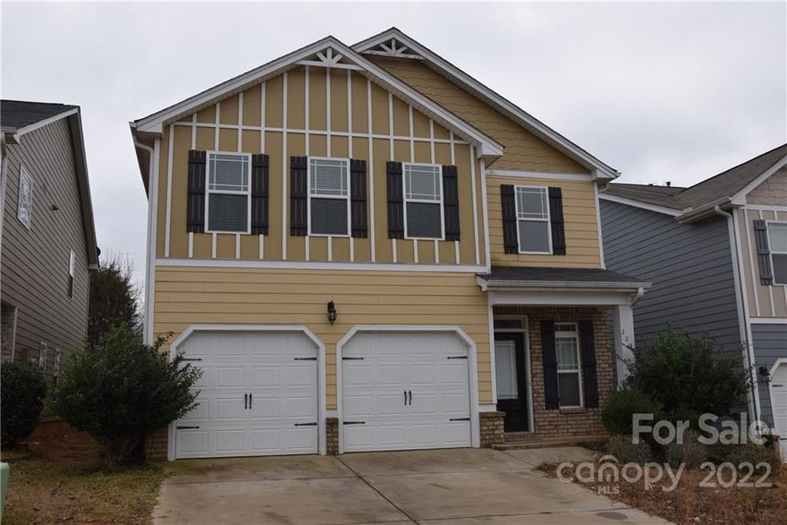 Your spacious five bedroom, two story home is awaiting. As you enter the two story open foyer you will appreciate the detail put into this home. No expense was spared in the moldings and trim throughout. Beautiful hand scraped engineered hardwoods lead you from the front door toward the living room with a stone fireplace and gas logs. Then continue into the kitchen equipped with granite counter tops, large island, oversized cabinets, and a gas range. The dining room is right off the kitchen and allows for easy exit to the covered porch out back. Ideal for entertaining in your private fenced back yard! The first floor also has a bedroom perfect for house guests or a home office. Your jaw will drop when you venture upstairs and see the size of the primary bedroom suite. So much natural light and double closets, as well as a large bathroom with dual vanities, garden tub, and glass shower. Zoned for desirable district 5 schools and close to I-85 and GSP airport for easy travel.