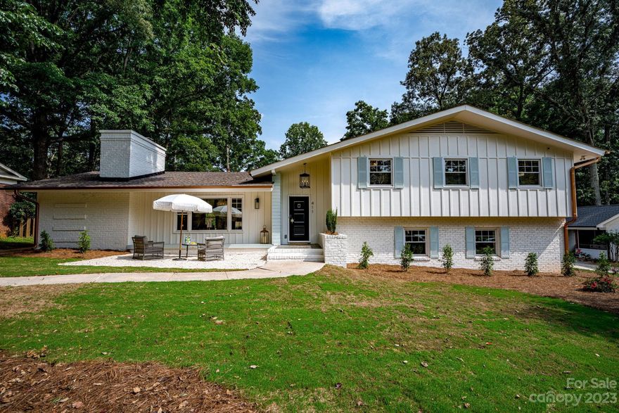 Another Casa Stiles renovation, introducing an exquisitely remodeled 3,350sqft 4 bedroom home in the desirable & charming Lansdowne neighborhood. Designer features include a "chef's kiss" kitchen that boasts GE Cafe appliances, waterfall marble edge oversized island, a featured wall for wine and private scullery and office. 2023 plumbing, electrical, and HVAC equipment. An entertainer's dream bonus room with wet bar that leads out to a spacious dreamy level back yard that would be beautifully appointed for a pool (rendering provided) and guest house. No detail spared, the bathrooms & bedrooms paired with an utmost functional footprint can easily accommodate even the most high maintenance of guests.  Be prepared to make many new friends as this home is a show stopper and one you will want to share! Situated off Providence Rd, close to Southpark with easy access to Ballantyne & Uptown and many of CLT's premier private schools.