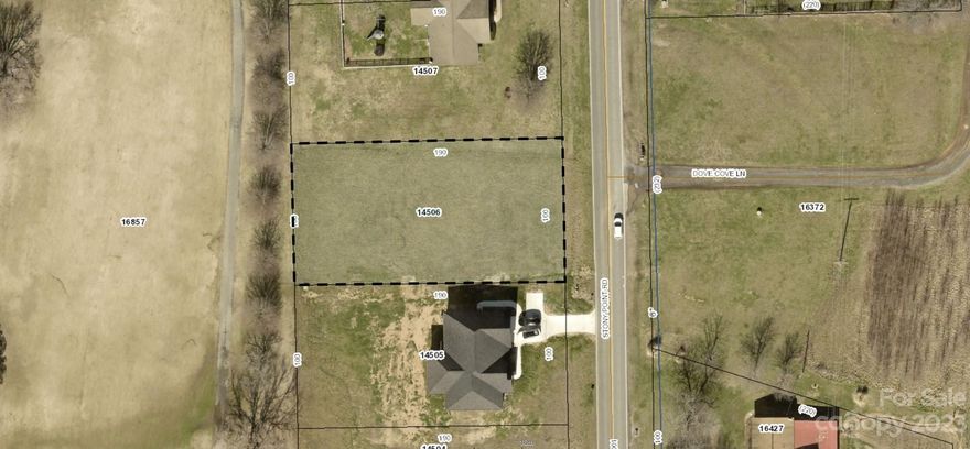 Vacant lot .44 Acre, level and cleared.  Dimensions:  100x190x100x190.  Woodbridge Restrictions apply.   Septic required; County water available=tap fee required.