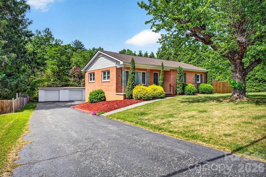 Completely move-in ready, this home is packed with meaningful upgrades and standout features. Gorgeous, newly uncovered and refinished hardwood floors bring warmth and character throughout, while major improvements — including a new roof, gutters, HVAC system, hot water heater, dishwasher, and window coverings — provide true peace of mind. Step outside to your own private backyard retreat where mature trees and added privacy fencing create a serene setting to relax, entertain, garden, or simply enjoy the outdoors. The property also features a chicken coop, a dedicated dog lot, and plenty of usable outdoor space with room to make it your own. A spacious garage offers exceptional storage, workshop potential, and flexibility for hobbies or projects. Combining thoughtful updates, functional spaces, and inviting outdoor living, 204 Oak Grove is the kind of home buyers wait for. 
Perfectly positioned in the heart of sought-after East Flat Rock, 204 Oak Grove beautifully blends timeless charm, modern updates, and everyday comfort. From the moment you arrive, you’ll feel the warmth and welcoming character that make this property truly special. Sun-filled living spaces create an inviting atmosphere perfect for quiet mornings, lively gatherings, and everything in between. Sip coffee on the porch, host friends and family with ease, and enjoy the convenience of being just minutes from shopping, dining, schools, and all the best of Henderson County. Whether you’re searching for a full-time residence, mountain getaway, or the perfect place to put down roots, this home offers a rare combination of comfort, charm, and value.