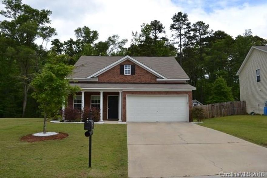 Beautiful home located in Village Green has tons of room!  Formal dining room and great room with lovely flooring.  Spacious kitchen w/ work island. Master on main level, 4 additional large bedrooms on upper level, and a total of 3.5 baths. Double garage with epoxy floors, and full irrigation.  Nice private view from screen porch! There is also a large common area next to lot.