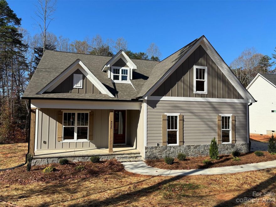 NEW CONSTRUCTION, beautiful home with designer upgrades & custom details.  Main level features Open floor plan w/gourmet kitchen & 4 bedrooms/3.5 baths.  Great room w/ custom stone fireplace and cedar mantel.  Gourmet Kitchen with all wood custom-built cabinets that extend to ceiling, oversized eat-in Island w/Carrara quartz tops, stainless steel appliances & walk-in pantry w/wood shelving.  Large Master Suite features tons of natural sunlight w/ coffer ceiling, luxurious oversized tiled shower & WIC.  Wide plank Luxury Vinyl Flooring on entire main floor and second floor loft. Second Floor split bedroom design with large closets, Bonus room and 2 large walk-in storage areas.  Oversized 2 car garage. Home built for outdoor living featuring covered front porch & rear deck. The highly desired Wynswept subdivision offers a fantastic, quiet neighborhood with easy commute to dining/shopping & Charlotte/Hickory/Mooresville.