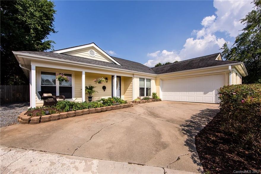 IN GROUND POOL to beat this heat!!  Private half acre fenced lot backing up to wooded area. Great home for entertaining! Open floor plan! Vaulted Great Room w/ wood burning FP. Updated kitchen w/ SS Appliances, stone counters, new cabinets. Split bedroom plan w/ Large Master.  Master Bath has updated vanity, lighting, & flooring. Separate shower & soaking tub. NEW ROOF & gutters 2014, NEW AC 2016, NEW Pool Liner & Pool Cleaner 2016, NEW Pool Pump 2015. Small community with NO HOA.