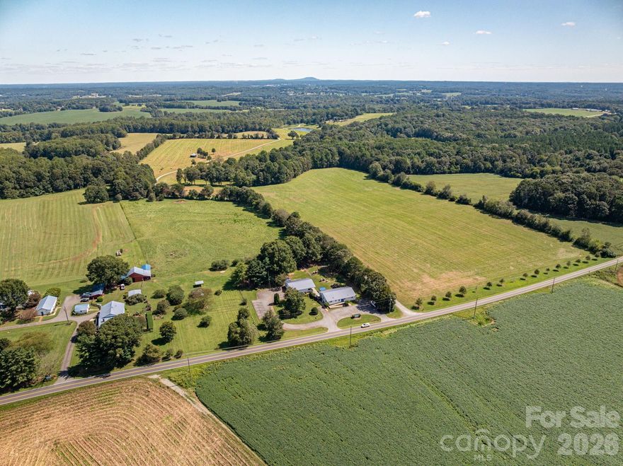 Unique opportunity in western Lincoln County! Situated on approximately 1.6 acres at 2482 June Bug Road, this versatile 4,500+ sq ft (2 separate buildings) property offers exceptional potential for a spacious single-family residence and/or an owner-operator setup. Zoned R-SF, the property provides flexibility for residential living while accommodating a variety of home-based or community-oriented uses. The property features two well-maintained buildings that both have served the community for more than 40 years as the Maryvale school/daycare facility. The functional layout offers numerous possibilities including conversion to a large private residence, multi-generational living, live/work arrangement, home-based business, or continued community-focused use. The generous lot provides ample outdoor space for recreation, gardens, parking, or future improvements while maintaining a peaceful rural setting. Conveniently located in the growing western Lincoln County area, the property offers both privacy and accessibility. RARE opportunity!