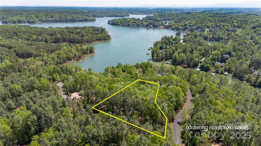 Nestled within the prestigious Old Wildlife Club community, this beautiful 1.42-acre off-water lot offers the perfect blend of privacy, nature, and luxury lake living. Surrounded by mature hardwoods and tucked into a peaceful setting, the lot provides an ideal canvas for your custom mountain-lake retreat. While not directly on the water, the property includes deeded access to the lake with a dedicated boat slip. Ownership also grants exclusive membership to Camp Lake James, the renowned lakeside adventure center. As a member, you'll enjoy access to a wide array of amenities including a resort-style pool, fitness center, outdoor amphitheater, tennis courts, and a vibrant calendar of social events and family-friendly activities. With miles of nearby hiking trails and a commitment to preserving the natural beauty of the land, Old Wildlife Club offers a rare opportunity to live connected to both wilderness and water, all within a secure and thoughtfully planned community