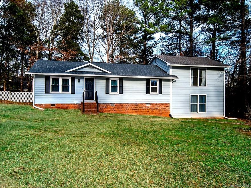 Private Country Living on almost an acre!  Features of this home include stainless steel appliances, tile and wood floor, a large bonus/recreational area downstairs, fenced in yard and plenty of parking.  Come check it out today!