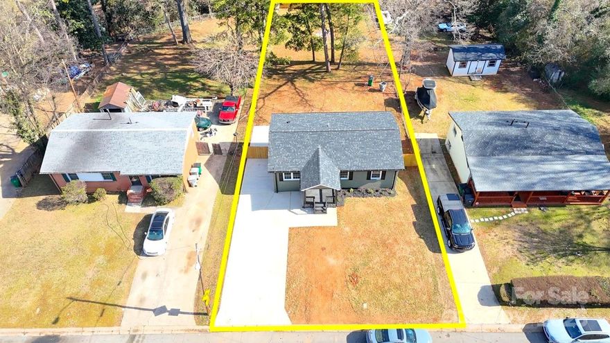 Welcome to this beautiful upgraded home offering flexible living spaces and modern convenience! Nestled in a desirable Charlotte neighborhood, this home features two primary suites—one on the main floor and another in the fully finished basement and a total of 3 and a half bathroom. The main level boasts a bright and airy layout, an inviting dining area, and a cozy living room—perfect for entertaining. The primary suite on this level offers a private retreat with easy access. Head downstairs to the spacious basement, which features the second primary suite, along with additional flex spaces—ideal for a home office, gym, media room, or guest accommodations. With its versatile layout and ample space, this home is perfect for multigenerational living or simply having extra room to spread out! Enjoy outdoor living at its finest with the beautifully designed stamped concrete patio and over half an acre of nice backyard. Plus, the brand-new driveway offers ample parking for 7+ vehicles!