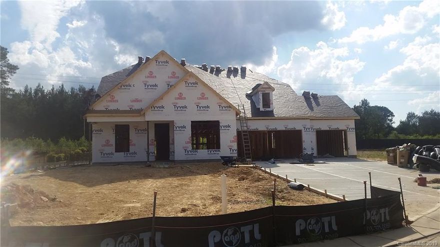 3 Car Garage with owner's suite on main along with 2 additional bedrooms,  This kitchen is beautiful with a wood hood, upgraded cabinets , gas cooktop, island is every cooks dream. Owner's suite features a walk in shower, large bonus room up with bedroom and bath, upstairs features a balcony, downstairs features a covered porch on rear and front. Enjoy the wide driveway with plenty of parking, August / Sept delivery, make this your home today