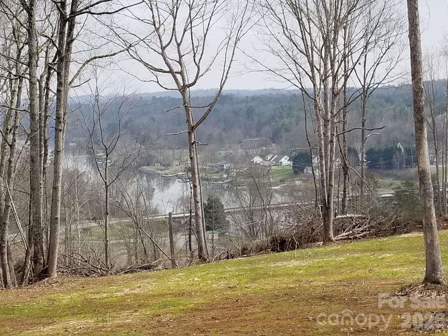 10-acre property with amazing views overlooking Lake Rhodhiss, Lake Hickory, and Rhodhiss Dam. The town of Rhodhiss land use plan adopted 6/14/22 recommends a mixed-use zoning which is a mixture of housing, commercial, civic, and recreational space with a goal of promoting a vibrant town center or significant location sometimes referred to as a destination to attract locals and visitors. Suitable for a tech or company campus. Less than 15 min to App State Hickory campus. 10 min to 321.