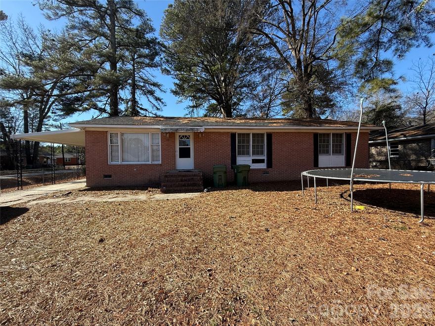 Located on a nice, corner lot in an established neighborhood in Bennettsville, this sweet home holds a lot of potential. With almost 1350 sq. ft., this 3 BR/1 BA features beautiful, original hardwood flooring, a separate laundry closet, and double sinks in the bathroom. Outside, you will find covered parking and a fenced in area. Make an appointment to see it today!