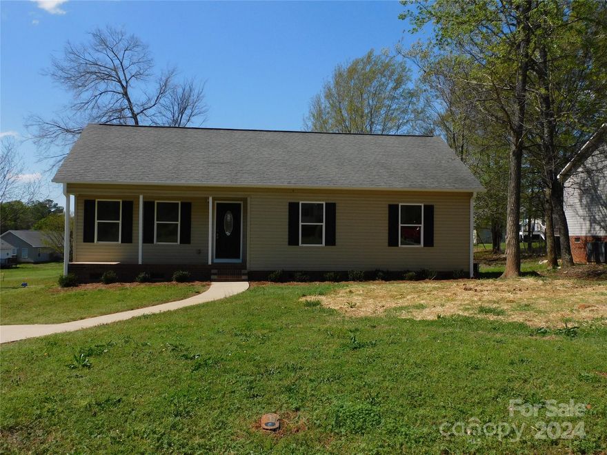 Completely remodeled home in great neighborhood.  New paint, Vinyl Plank Flooring, new lighting fixtures, toilets, and ceiling fans in living and primary bedroom .  new appliances: Microwave, dishwasher, smooth top range and new countertops in the kitchen.  Most doors and all knobs replaced,  New exterior doors.  New  New gutters.  Front porch and rear deck over looking large rear yard.  All Electric heat pump.  Will not Last Long!