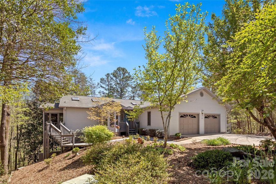 RUMBLING BALD ON LAKE LURE...........This home is located at the end of the private cul-de-sac, in the areas most popular resort offering golf, tennis, swimming, boating, fishing and miles of hiking trails! This 3800 sq ft, custom built, resort home offers a bright open floor plan and features an indoor swim space for the ultimate in exercise, right in your home. Priced to sell at only $635,000.