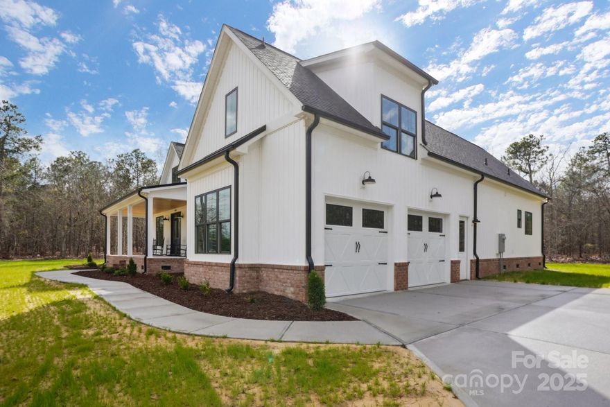 Back on the market due to contingency.  Welcome to luxury country living in this brand-new, FULLY custom home!  Designed with high end finishes and thoughtful details, this stunning property offers both comfort and elegance in a peaceful rural setting. Step inside to an open and inviting layout, featuring a spacious living room with soaring 10-foot ceilings- the perfect place to gather and unwind. This open layout features a gourmet kitchen with quartz counter tops, gorgeous custom cabinetry, and a spacious walk-in pantry with coffee bar.  On the main level, your spa-like master bed and bath await you with a walk-in custom tile shower and soaker tub for ultimate relaxation.  Additionally, two spacious bedrooms with a jack and jill bath, laundry room, and a convenient half bath for guest. Upstairs- you'll find a second master bed and bath with walk in closets and an amplitude of storage space.