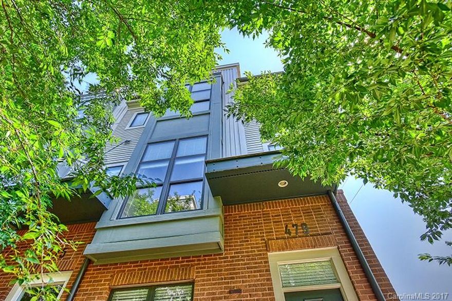 Modern, 3-story, end unit condo offering 3rd floor Master suite, hardwood floors, large kitchen, and stainless steel appliances. With the well designed floor plan, you’ll appreciate the open interior layout and spacious patio perfect for entertaining, while also benefiting from the privacy and comfort offered throughout the home. This unit does not disappoint. Enjoy the conveniences of living Uptown in this move-in ready condo! HVAC replaced Dec 2016. 2 deeded/reserved parking spots.