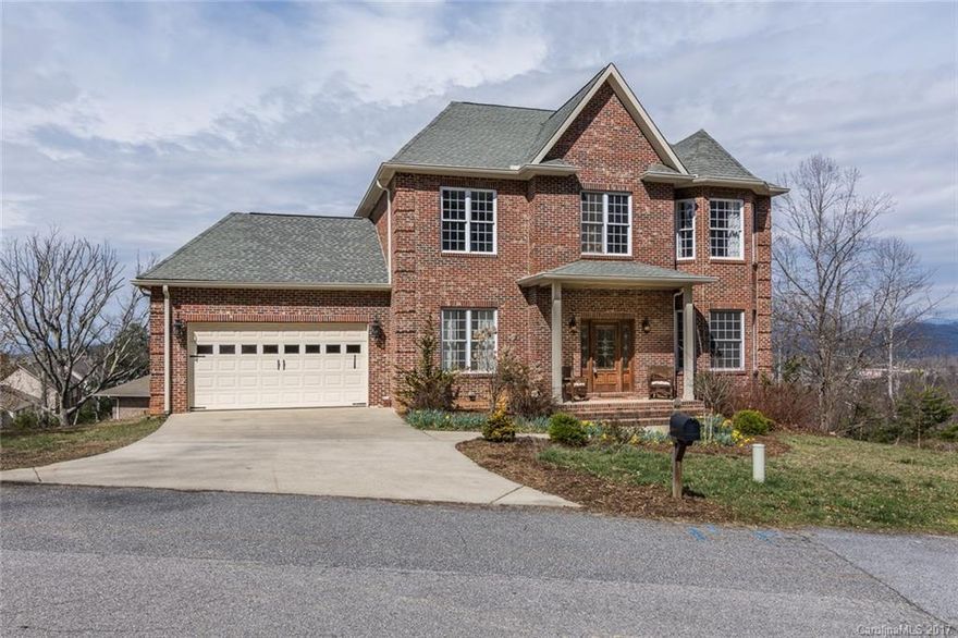 Long Range views, luxurious kitchen with granite countertops, stainless steel appliances and cherry cabinets. This home boasts a large unfinished basement that has sheet rock and full bath just needs carpet and paint to take this home to over 4500 square feet! Rinnai Hot Water Heater. Main level has dining room, office/5th bedroom, family room and oversized porch with long range views. Master bedroom has balcony with incredible views also.