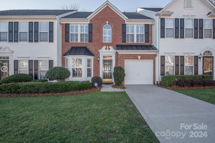 Beautiful 3BR 2.5BA Townhome w/ garage, meticulously kept by it’s original owners! Gleaming hardwoods throughout the main level & an open concept that feels spacious & bright w/ 9ft ceilings, lots of windows, transoms & classic white plantation shutters throughout. Kitchen w/ custom Corian countertops, SS appliances, lots of cabinets, some w/ pull-out trays, & a pantry closet. Upstairs the sizable Primary BR en-suite w/ tray ceiling, 2 walk-in closets, large BA w/ vanity, soak tub & separate shower. Also, 2 addt’l BRs, laundry room, 2nd full BA, pull-down attic stairs, security system, smart thermostat. Outback, enjoy the private patio under the large pergola and admire seasonal blooms in the small garden. Relax in the community pool or take the short walking trail to charming downtown Cramerton & Goat Island Park. Lots to offer in these larger townhomes in Cramerton Village and the HOA fee includes water, sewer, trash pick-up, lawn & exterior maintenance, pool & more!