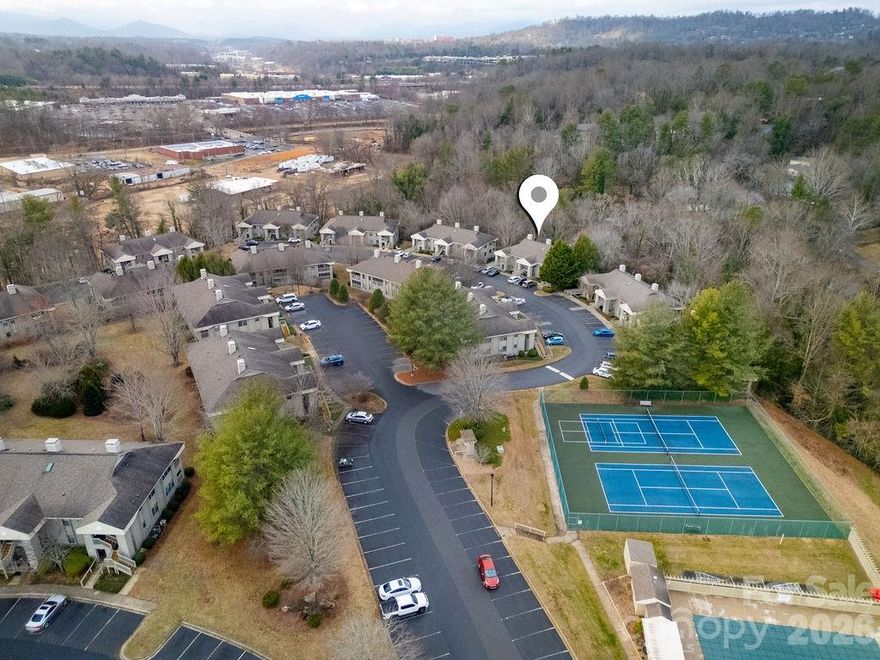 This special 2-bedroom, 2-bath condo is located in the desirable Cloisters community in East Asheville. Just steps from the community tennis courts and swimming pool, this upper-level home offers an open floor plan and is ready for your personal touches.

With only a few steps to access the unit, you’ll find two spacious bedrooms, two full bathrooms, and a spacious living area that opens to a screened-in porch nestled among the trees — the perfect spot to relax and unwind.

This special home is ready for its next chapter. Enjoy a prime location just minutes from Asheville’s renowned dining, shopping, and entertainment, as well as the nearby Nature Center and more.

The HOA fee conveniently covers roadways, gates, lawn and ground maintenance (including trees and shrubbery), pool, tennis courts, clubhouse, roofs, all exterior building components, mailbox kiosks, and trash removal — allowing for easy, low-maintenance living.  Schedule your showing today as this home has been priced to sell!