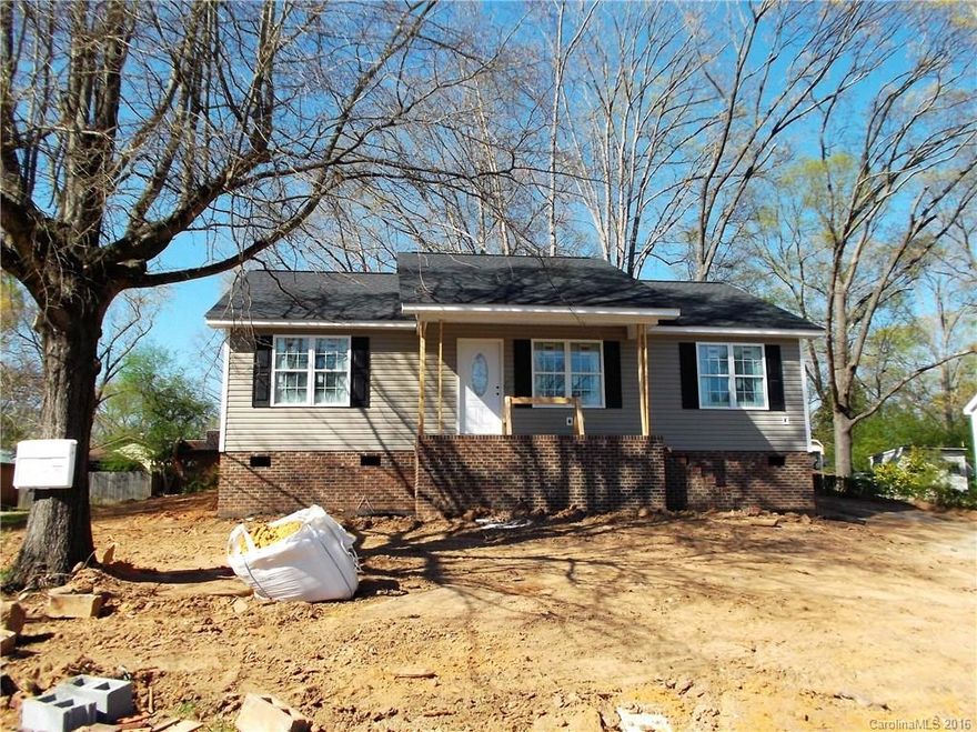 New Construction home,  Hardwood and ceramic flooring, and carpet in bedrooms. Granite countertops in kitchen and bathrooms.  Laundry room.  Covered front porch and a patio out back for your bbq's.