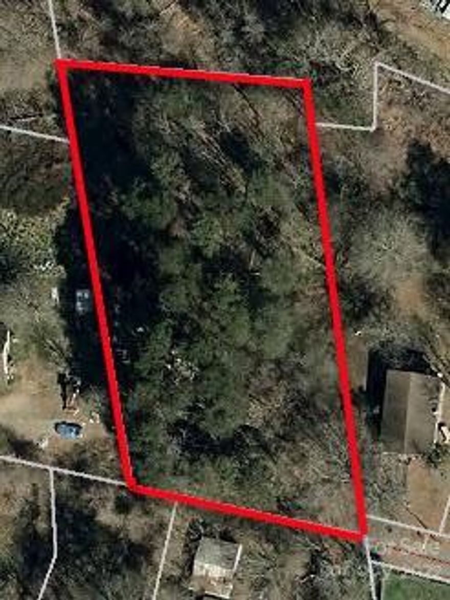 Bring any and all offers. Back side of property adjoins Rutherford Board of Education Property. Located at the end of W Miller St in Spindale. It appears that neighbors have encroached but no survey has been performed to confirm that.