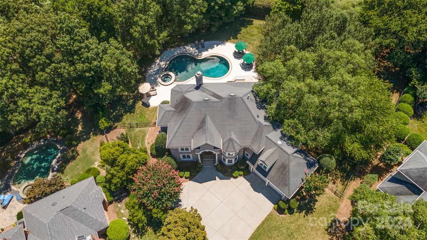 Resort-style living in Piper Glen. This home sits on a unique cul-de-sac lot offering a large, flat, private yard. The backyard is a stunner with approximately 270 feet of golf course frontage on the 5th fairway on the TPC course. This light-filled home has a grand, two-story family room. Main level has an office with French doors, a large dining room, bedroom with ensuite with its private patio overlooking the pool and golf course. The spacious kitchen has a built-in refrigerator, gas stove, two full-sized ovens & beverage refrigerator. Upstairs, are two large bedrooms,   with a connecting bathroom, large bonus room, and the Owner's Suite. The oversized bonus room has a balcony overlooking the gorgeous backyard and golf course. Piper Glen is a premier neighborhood in South Charlotte, located inside I-485. There are numerous grocery stores, including Trader Joe's, Greenways/Trails, restaurants, the Ballantyne Bowl, and many shopping options within less than three miles.