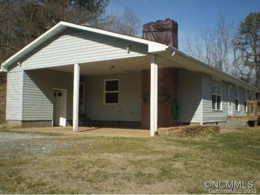 Sylva City limits - 3 bedrooms, 2 bath home on large 1.05 acre, view lot. Features include heat pump, fireplace, new carpet, deck, carport and end of the road privacy.