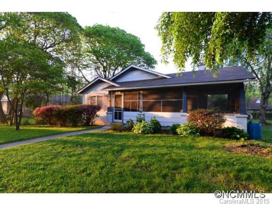 Great In-Town Bungalow - on large fenced city lot. Wrap around porch, wood burning fireplace, and hardwood floors contribute to the charm of this home. 1 block off Main Street in downtown Brevard.