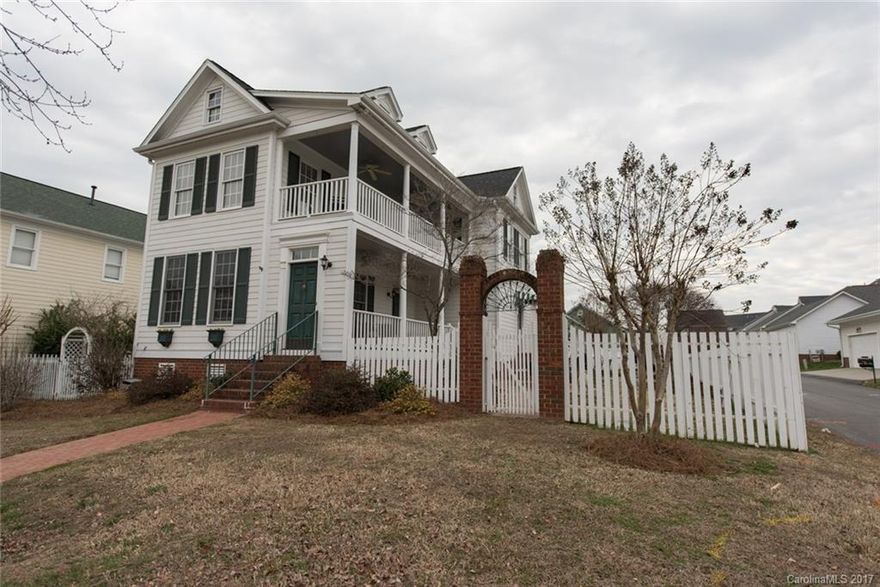 Must see Charleston Style home in Afton Village! Walk to Everything..Park, Restaurants, Shops, YMCA..Exterior features Double porches, two patio area's and fenced, corner lot..perfect for entertaining. Interior Features Heart pine flooring in living room and dining room, open kitchen with bar, extensive crown moulding throughout, and fireplace. Master down with additional 3 beds upstairs. HVAC is less than a year old and Roof/Oversized Gutters approx 4 years old.TONS of attic space for storage!