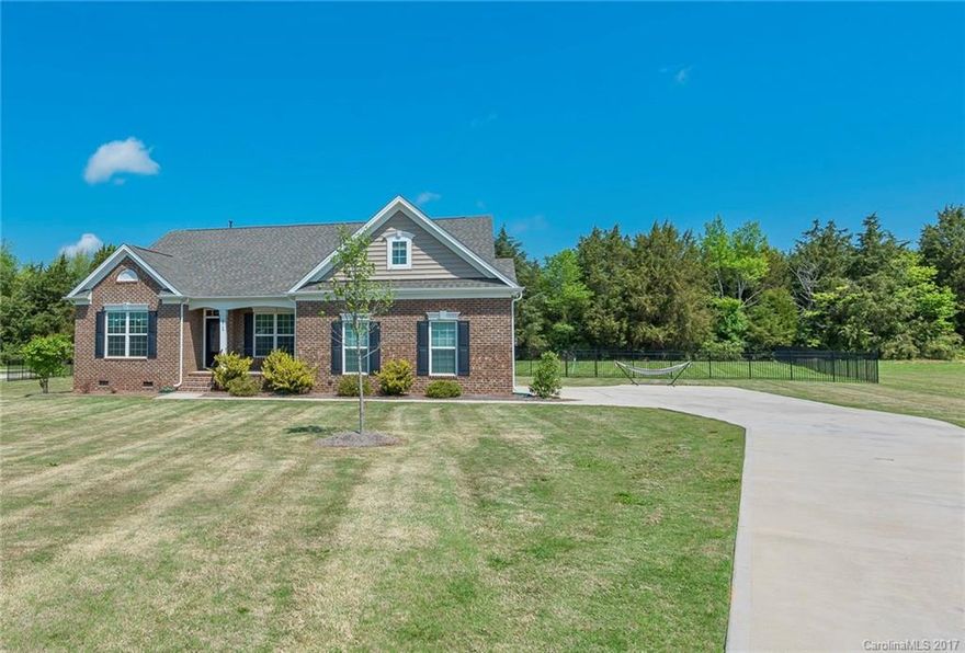 Well designed plan with open living space on oversized 1+ acre lot. Large great room with gas fireplace, open to sunroom, kitchen and breakfast bar. Granite countertops, stainless appliances, and hardwood floors throughout.  Spacious master with tray ceiling and his and her walk-in closets. Large guest bedrooms with guest suite and loft on upper level.  Treated wood deck fully fenced backyard. York Prep, K-12 another school choice in walking distance. Don't miss out on this beautiful ranch home.