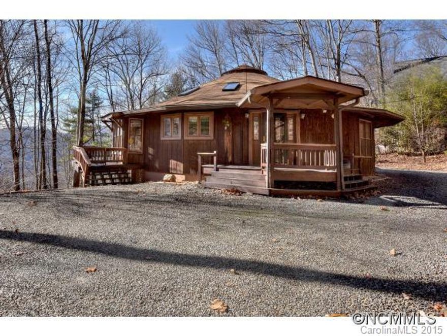 Surrounded in natural beauty this Well built quality "Deltec" home on 1.68 acres of privacy. Amazing views and colorful sunsets complete this property. Vast span of windows in the Great Room bring in the natural light. Enjoy the cool evenings around the stone fireplace in the Great Room. Entertaining is a breeze with the open floor plan and the great decks that complement this house.  Don't miss this beauty make your appointment today.