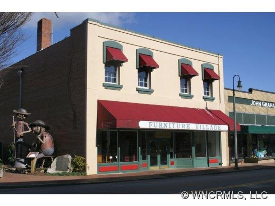 Historic building for sale in a prime location in the Central Business District of Waynesville, NC.  With 23,000 s.f. each floor contains approximately 7700 s.f. of mostly open space.  Buyer has many opportunities for redevelopment as a retail space, residential, office, etc.  Parking is available on Main St., Miller St., and the public lot is behind the building.  This is the best business location in Waynesville! EM to Buyer's Attorney.