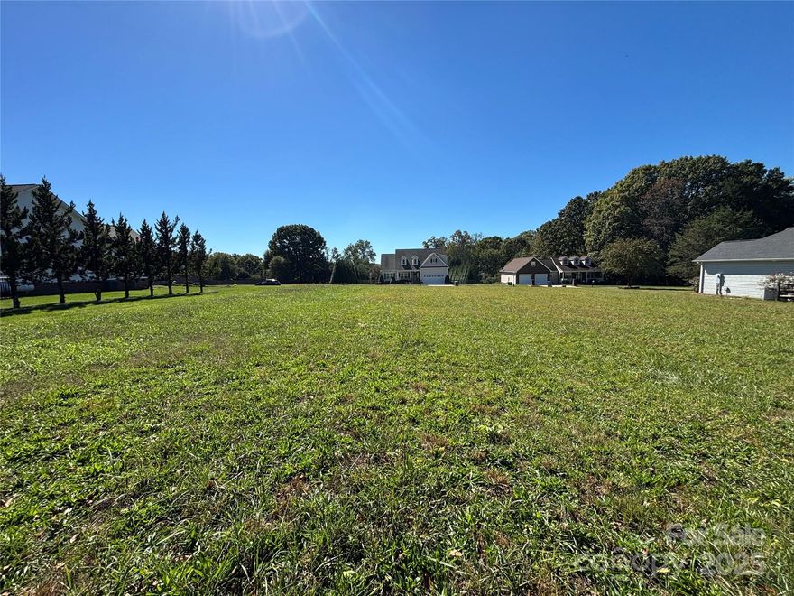 MULTIPLE OFFERS TO BE REVIEWED AROUND 10 AM on 12/5** for this Prime .69-acre lot in Donsdale, an established subdivision of homes and beautiful landscape, with real estate brokers and builders as neighbors. This property is flat, cleared, and offers underground utilities like high-speed internet access and county water service at the road. No septic records have been found. 

Conveniently located near interstates, shopping, and dining, but without city taxes. Ideally situated in beautiful Northern Iredell County with commercial and residential growth, including the recently expanded Jennings Park, which has pickleball courts, wooded trails, picnic shelters, a playground, an ultimate frisbee course, baseball & soccer fields. 

This is a rare opportunity to buy property and build your dream home in one of the area's most sought-after locations. HOA $300/year and does Architectural Review with a 2000 SF minimum.  Limited lots remain, making this a truly valuable find in a growing area central to Lake Norman, Charlotte, Hickory, Winston Salem, and the NC Mountains.