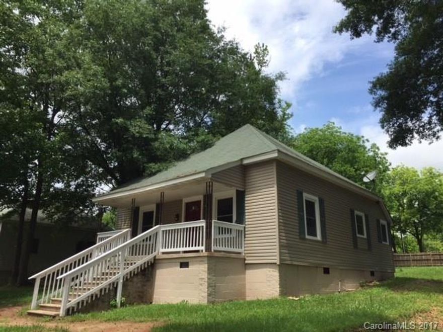 Just like a new home when you walk in the door. Home has been completely remolded  and now has 2 bed 2 baths.
New walls ,floors, A/C unit new. All new bathrooms, solid wood doors. Comes with stove and refrigerator. Full front porch with shade trees .You will love this home. Come see it today.