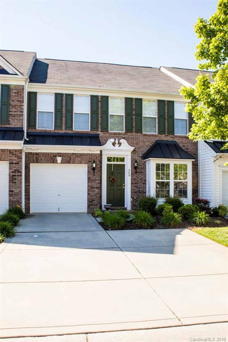 Move in Condition. Beautiful wood floors in living areas. Spacious kitchen with ample counter tops and 42" cabinets. Living room has cathedral ceiling and gas log fireplace. Large Master on main level. Separate shower and garden tub. Walk in closest. Upstairs secondary bedrooms are generously sized each with large closet. One car garage with opener, but important - two car drive width for extra car. Convenient neighborhood in terrific school district.