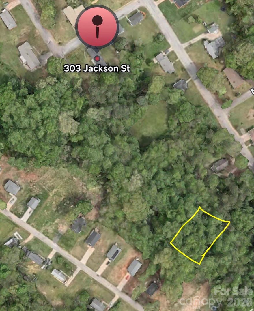 Build-ready 0.32-acre homesite in East Spencer! This property presents an excellent opportunity to build your future home while enjoying the privacy and natural beauty of a wooded setting. The seller has already completed substantial site preparation, including clearing a significant portion of the lot while thoughtfully preserving surrounding mature trees to maintain privacy and character.

To further enhance the homesite, the seller brought in 30 truckloads of soil, raising the surface level by about three feet to help improve the building area and reduce potential flood concerns. These improvements provide a valuable head start compared to many vacant parcels that still require extensive clearing, grading, and site preparation before construction can begin.

As an added benefit, the seller is including one of three pre-designed home plans approved for construction on this lot, allowing buyers to select the option that best suits their vision. A survey has also been completed, offering additional convenience and confidence during the planning process. For buyers seeking a streamlined building experience, the seller can also provide contact information for a reputable local builder who is familiar with the property and available to construct a custom home on the lot at a favorable price.

Situated in the welcoming community of East Spencer, this property offers a peaceful residential setting while remaining conveniently located just minutes from downtown Salisbury, shopping, dining, schools, and major highways including I-85, providing easy access to surrounding areas.

Utilities are available nearby; buyers are encouraged to verify utility line locations with Salisbury Rowan Utilities and confirm building requirements with the appropriate local authorities.

This property presents an excellent opportunity for buyers, builders, or investors looking to secure land in a growing area.