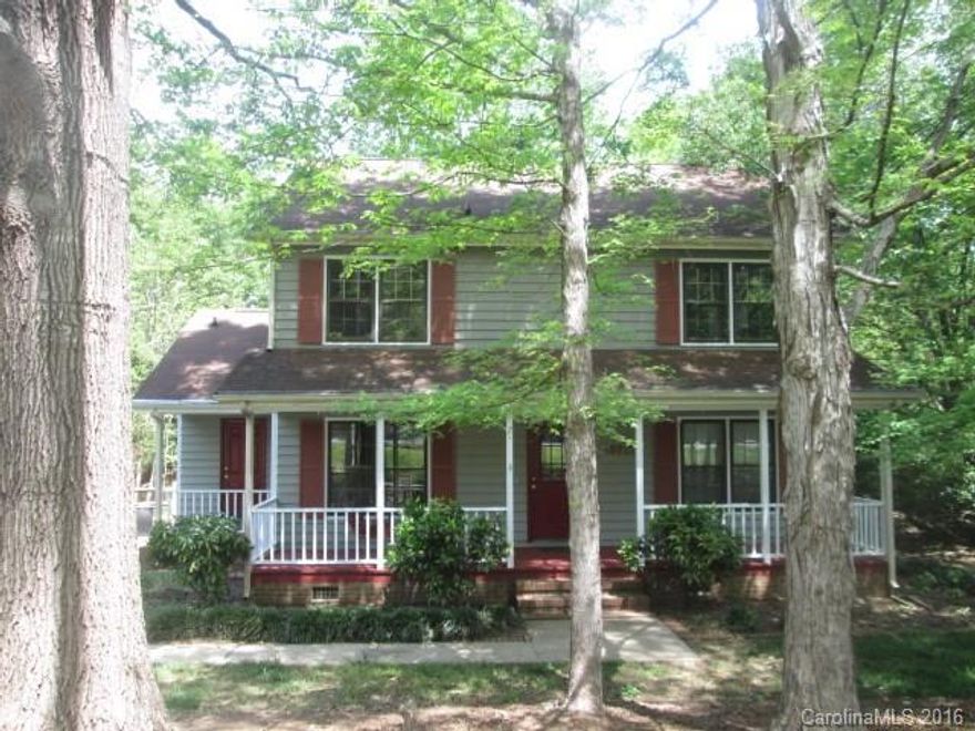 Large den has masonry fireplace with gas logs and den opens to living room. Kitchen has been updated and has a bay window. Country front porch plus a deck with built in seating. Private lot has beautiful trees and fenced backyard. Pet fee is per pet that does not exceed 30 lbs.