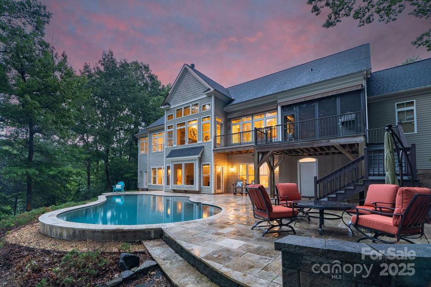 Location. Lifestyle. Lakefront Luxury. A rare Charlotte retreat with close to 400 ft of shoreline, a saltwater pool, and sunsets you’ll never forget. Set on 1.2 acres of natural privacy with no HOA, a private dock, and a drive home that feels like entering your own preserve. Custom built with timeless details, soaring ceilings, 5" solid wood floors, heavy molding, stone fireplaces, and walls of windows filling the home with natural light. Entertain with ease in the open kitchen, screened porch with Ezebreeze windows, or by the saltwater pool overlooking the lake. For even more fun, a large professional multipurpose soundproof media studio, oversized extra deep garage with room for a lift, extra tall doors, and almost 1500 sf of unfinished space to build your dream. Everything you need on the main level, with more space below for a separate living area. Easy commute to Uptown and the airport. This is resort-style living. If you’ve been waiting for “the one” on Lake Wylie, this is it.