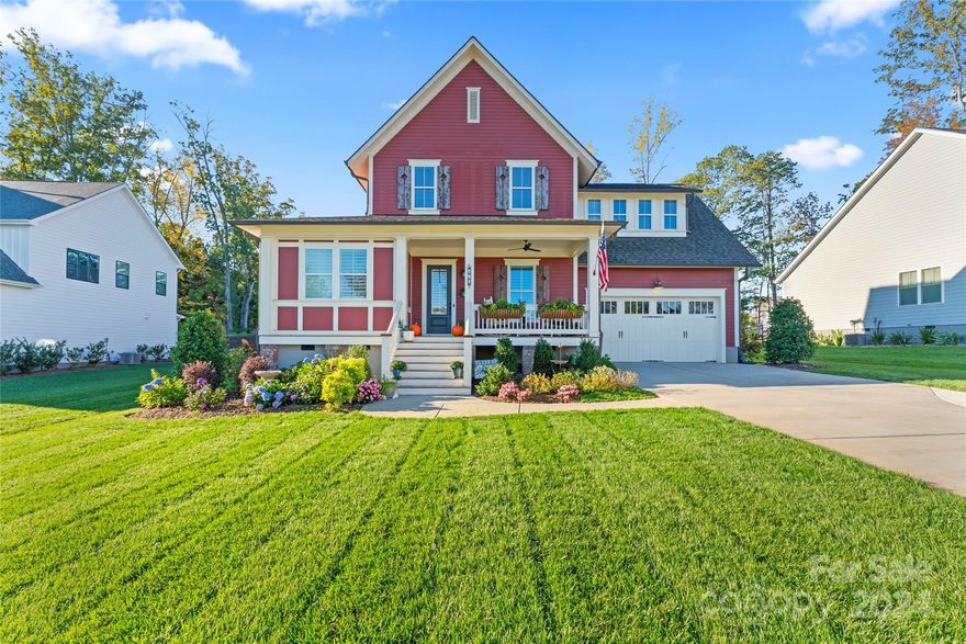 Stunning Saussy Burbank home in the desirable Nims Village! Enjoy entertaining in the backyard w/ covered back deck, built-in kitchen area AND saltwater pool w/ waterfall & sun shelf. This 5 bedroom, 4.5 bath includes 10 ft ceilings, plantation shutters, hardwood floors, built-ins, exposed wood beams & gorgeous trim details throughout. Enjoy cooking in the gourmet kitchen w/ large farm sink, quartz countertops, massive island, roll out tray cabinetry, stainless steel appliances, tile backsplash & floating shelves. The open concept living room greets you w/ wood beams, built-ins & gas fireplace w/ a ton of natural light. Conveniently located on the main floor, the primary bedroom includes hardwood floors, large his and hers walk-in closets & attached bathroom. A secondary guest suite w/ attached bath is on the opposite side of the home for privacy. Upstairs there is ample space w/ 3 bedrooms & 2 full baths w/ a separate living space! Don't miss out on everything Fort Mill has to offer!