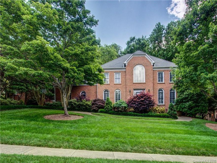 Price adjustment on impressive brick home tucked away in the Rosecliff community:  Most windows have plantation shutters, Plant lovers landscaping dream in park like setting with a large deck perfect for entertainng, detailed classic molding and wainscoting, interior workshop in the finished garage area, two staircases with one leading to kitchen, 3rd staircase leads to an extra large attic that could be converted to additional living space, convenient central vacuum, multizoned heat & air.