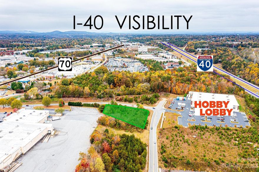I-40 Visibility for this corner lot across the street from Hobby Lobby's entrance and nestled between McDonald Parkway and Hwy 70. Zoned C-3, Regional Commercial District, providing for a full range of retail and service businesses. Level terrain. Natural gas, city water and sewer available at street. Additional corner lot available across the street. Motivated sellers - priced well below tax value and recent appraisal!