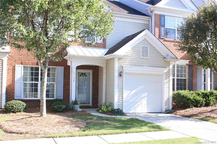 Must see town home is ready for new owners. Attractive, bright, open flr plan has fresh paint, high ceilings & tall windows. Great room with gas fireplace is open to kitchen and breakfast rm with glass doors leading to patio. Formal DR features picture frame molding. 3 BR/2 baths upstairs. Master suite features walk in closet, separate tub & shower & double sinks. Home has an attached 1 car garage and extra parking right across the street. Community offers pool, tennis, playground and clubhouse.