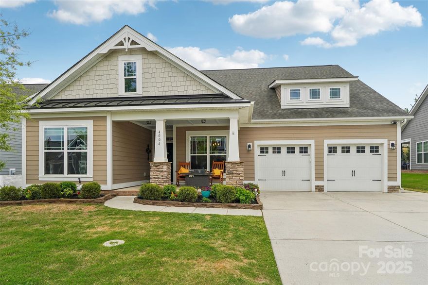 Stunning 4-Bedroom/3-Bath Home! Welcome to this beautiful home in one of the area's most sought-after communities! From the moment you step onto the oversized front porch, you'll feel at home. Inside, is an inviting entry leads to an expansive open-concept main level with a spacious office/flex room and a guest suite with an adjacent full bath. Chef’s Dream Kitchen – Featuring an extra-large island, raised breakfast bar seating, gas cooktop, double oven, and abundant counter space perfect for entertaining! Living Room – Complete with a gas log fireplace, ideal for relaxing. Primary Suite on Main Level – Your private retreat with an XL walk-in shower, double vanities, and a custom walk-in closet. Upstairs features  Loft in between 2 spacious guest bedrooms and a full bath. Outdoor Oasis – Enjoy year-round outdoor living with an outdoor kitchen & bar, hot tub (to remain), deck, and privacy wall. Resort-Style Neighborhood Amenities. Plus, lawn maintenance is included in HOA dues!