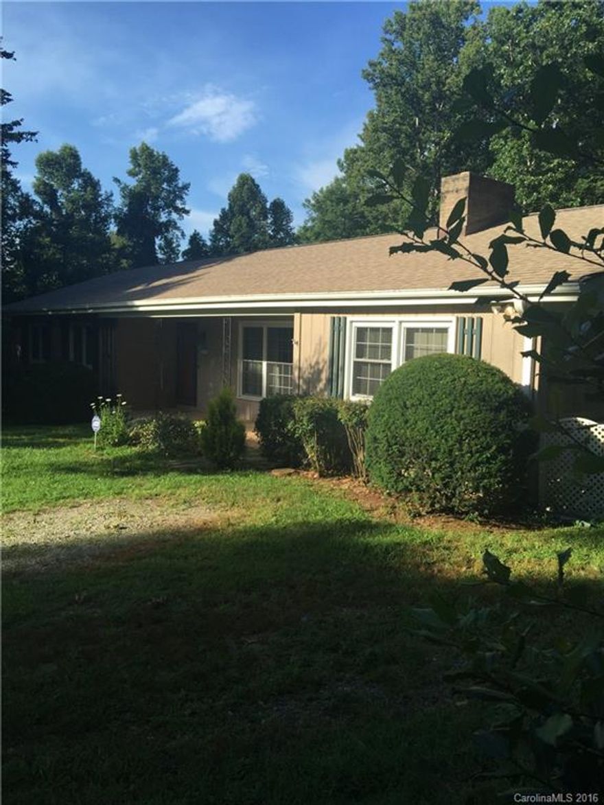 Private mountain estate. Great family home, vacation home, or rental on 8.42 Acres. Home features 4BR/2BA, hardwood floors, workshop in basement, a whole house generator and outside shed. Home can also be purchased with more acreage.  See MLS # 3192481. Many with view building sites on property. This hard to find home and land zoned R3.  Priced to sell!