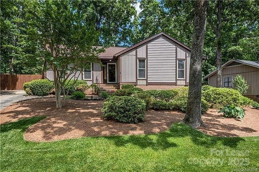 Step into this inviting Mint Hill Ranch home in Timber Creek subdivision, where comfort and style come together seamlessly. Gleaming hardwood floors stretch across the entire home, setting the stage for warm gatherings and everyday living. The kitchen and bathrooms have been beautifully updated, giving a fresh, modern feel without losing the home’s timeless charm.  The kitchen features Stainless steel Range, Refrigerator, Microwave, & Dishwasher with Granite countertops. The oversized Primary Suite offers the perfect retreat after a long day.
Outdoors, you’ll discover an entertainer’s dream. A striking three-level deck provides plenty of space for parties, cookouts, or quiet evenings under the stars. A separate patio area creates the perfect spot for grilling or setting up an outdoor kitchen, while the lush landscaping surrounds you in color and privacy.
With 3 spacious bedrooms, 2 full baths, and an easy one-level layout, this home blends convenience with elegance. Don’t miss the chance to make this Timber Creek gem your own—schedule a showing today!