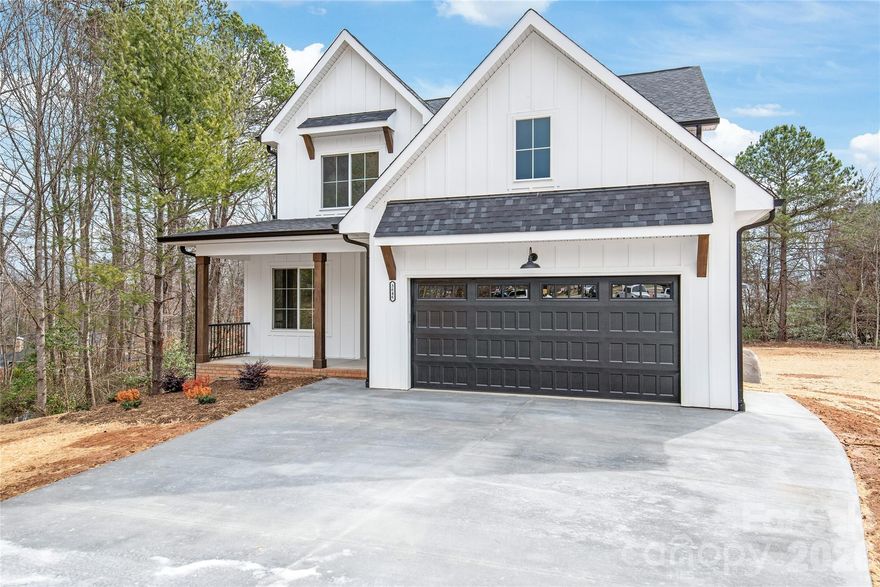 Welcome to this stunning new build at the end of a cul-de-sac in the desirable Willow Place subdivision. Situated on nearly an acre lot, this beautiful home offers 4 spacious beds and 2.5 baths, providing ample space for your family. Inside, you'll find a versatile flex room that can be used as an office, playroom, or additional living space.The bright living room features large windows and a cozy fireplace, perfect for relaxation and entertaining. The chef’s kitchen is a dream, with modern cabinetry, a gas stove, a butler's pantry, and a large walk-in pantry. A well-designed drop zone keeps things tidy.The first floor boasts hardwood floors, with iron spindles on the stairs adding sophistication.This home offers the best of both worlds—easy access to outdoor adventures like fishing, hiking, and more, all while being just minutes away from the amazing restaurants and vibrant downtown Hickory! Whether you’re exploring the great outdoors or enjoying a night out, this location has it all.